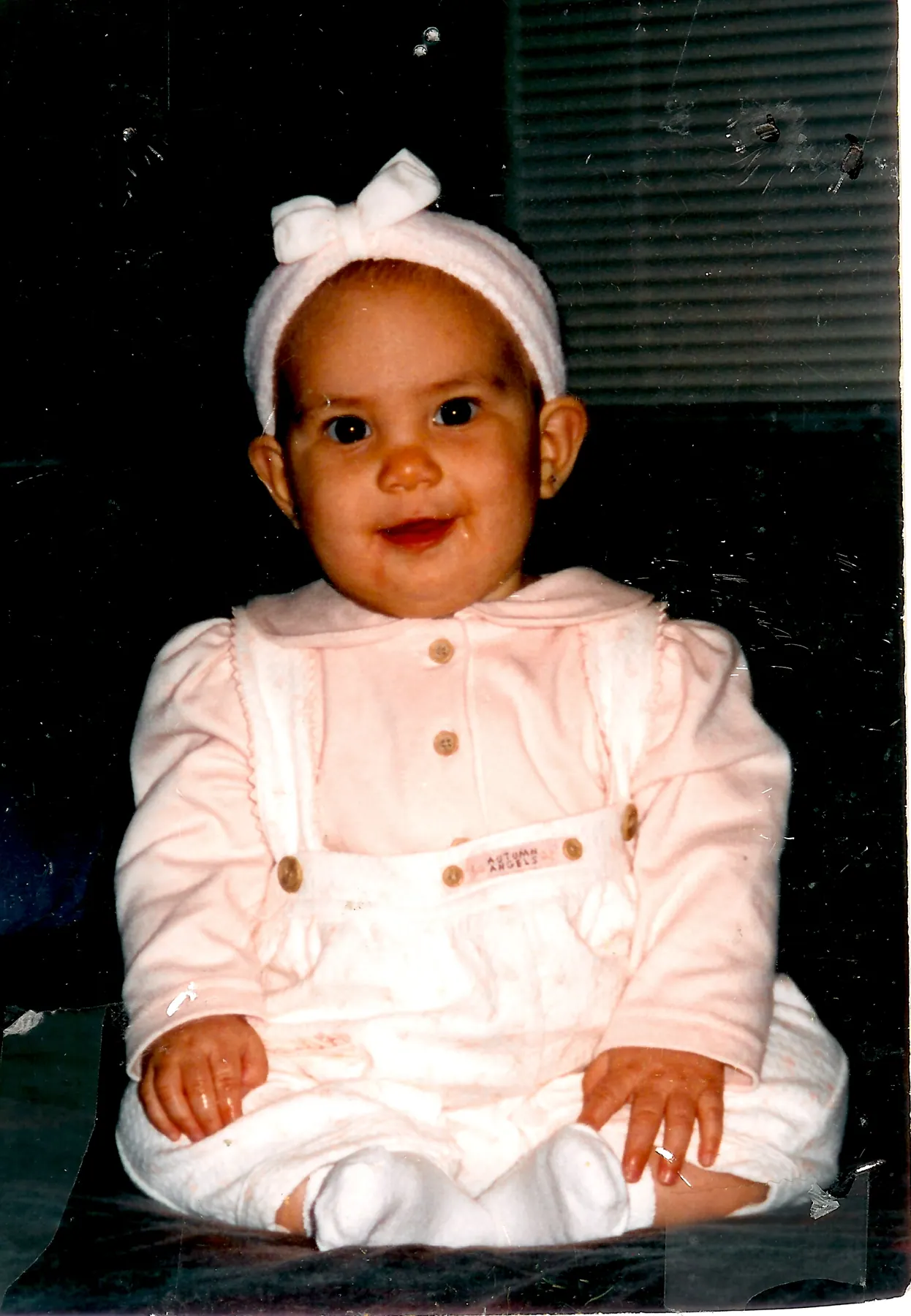 Kimberly in a photo labeled six months