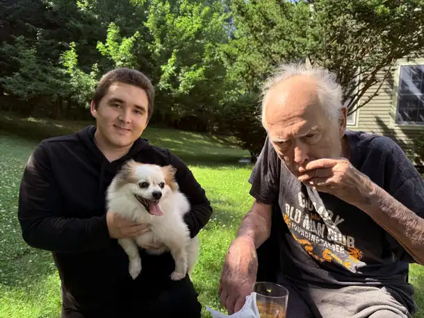 Konrad and Grandpa in a photograph labeled 2026